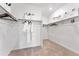 Spacious walk-in closet with white walls, carpeted floor, and ample storage for a modern home at 3381 N Denali St, Aurora, CO 80019