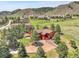 Aerial view of the property showcasing the home and surrounding landscape at 10991 Expedition, Littleton, CO 80125