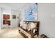 Inviting hallway with tile floors, bench seating, and stylish decor at 10991 Expedition, Littleton, CO 80125
