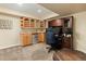 Basement featuring a kitchenette, built-in shelves and cabinets at 7307 Pine Forest Ln, Parker, CO 80134