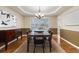Formal dining room with seating for six at 7307 Pine Forest Ln, Parker, CO 80134