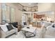 Open living room with view of second story at 7307 Pine Forest Ln, Parker, CO 80134