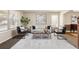 Modern living room features a stylish seating area and a bright, airy atmosphere at 7307 Pine Forest Ln, Parker, CO 80134