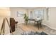 Office space featuring neutral walls, large windows, and modern decor at 7307 Pine Forest Ln, Parker, CO 80134