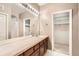 Bathroom with a large vanity and mirror, providing plenty of storage space at 6742 S Winnipeg Cir # 105, Aurora, CO 80016