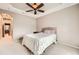 Comfortable bedroom featuring a ceiling fan and neutral decor at 6742 S Winnipeg Cir # 105, Aurora, CO 80016