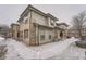 A brick-accented building with gray siding stands out with its well-maintained exterior at 6742 S Winnipeg Cir # 105, Aurora, CO 80016