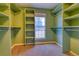 Walk-in closet with custom shelving and ample storage, maximizing organization and convenience at 6812 Blue Jay Dr, Parker, CO 80138