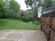 Expansive backyard featuring a concrete patio and lawn, perfect for outdoor entertaining and relaxation at 13651 Silverton Dr, Broomfield, CO 80020