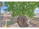 Outdoor balcony area with a grill, lush greenery views, and ample space for outdoor living at 3850 Vallejo St, Denver, CO 80211