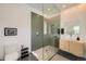 Modern bathroom with a glass-enclosed shower, sleek vanity, and stylish fixtures at 3850 Vallejo St, Denver, CO 80211