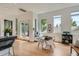 Bright and airy kitchen area with natural light, modern decor, and an adjacent dining space at 3850 Vallejo St, Denver, CO 80211