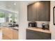 Charming kitchen boasts stainless steel appliances and modern cabinets at 3850 Vallejo St, Denver, CO 80211
