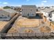 Aerial perspective capturing a spacious backyard with a fence, offering privacy and room for outdoor activities at 2489 Alto St, Fort Lupton, CO 80621