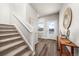 Welcoming entryway with a staircase and modern decor at 2489 Alto St, Fort Lupton, CO 80621