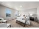 Serene main bedroom with ample natural light and stylish furniture at 2489 Alto St, Fort Lupton, CO 80621