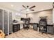 Finished basement features an office space with multiple workstations and storage at 7120 Galapago St, Denver, CO 80221