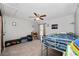 bedroom featuring a lofted twin bed, ceiling fan, natural light, and neutral walls at 10298 W Dartmouth Ave, Lakewood, CO 80227