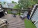 Deck featuring outdoor seating and a grill at 10298 W Dartmouth Ave, Lakewood, CO 80227
