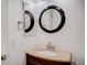 Traditional bathroom features a vanity and mirror at 7870 W 87Th Dr # J, Arvada, CO 80005