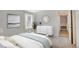 Calm bedroom with large window and plenty of natural light at 7870 W 87Th Dr # J, Arvada, CO 80005