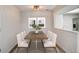Bright dining area featuring modern decor and comfortable seating for six at 7870 W 87Th Dr # J, Arvada, CO 80005