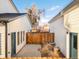 Private fenced backyard with patio space, offering a serene outdoor retreat perfect for relaxation and entertainment at 2952 S Delaware St, Englewood, CO 80110