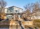 Beautiful two-story home with a combination of modern design elements and natural wood accents at 2952 S Delaware St, Englewood, CO 80110