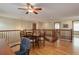 Spacious bonus room featuring hardwood floors and a cozy seating area at 10032 Astoria Ct, Lone Tree, CO 80124