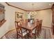 Formal dining room with chandelier, hardwood floors, and space for hosting gatherings at 10032 Astoria Ct, Lone Tree, CO 80124