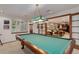 Entertaining game room featuring a pool table and ample space for recreation and enjoyment at 10032 Astoria Ct, Lone Tree, CO 80124