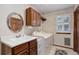 Bright laundry room features modern washer and dryer, ample counter space, and storage cabinets at 10032 Astoria Ct, Lone Tree, CO 80124