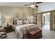 Comfortable main bedroom with vaulted ceiling and well-lit ambiance, exuding relaxation at 10032 Astoria Ct, Lone Tree, CO 80124
