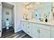 Guest bathroom with double vanity and a toilet at 3734 Makley Cir, Castle Rock, CO 80104