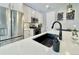 Modern kitchen with stainless steel appliances and white shaker cabinets at 3734 Makley Cir, Castle Rock, CO 80104