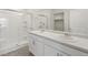 Modern bathroom with double vanity and shower at 27500 E Cedar Pl, Aurora, CO 80018