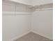 Large walk-in closet with double hanging rods at 27500 E Cedar Pl, Aurora, CO 80018