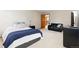 Spacious bedroom with comfortable furniture and plenty of natural light at 2650 S Vaughn Way # B, Aurora, CO 80014