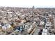 Aerial view showing the neighborhood near the property with city skyline in the distance at 108 W Byers Pl # G4, Denver, CO 80223