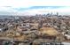 Aerial view showing the school building with solar panels in the city at 108 W Byers Pl # G4, Denver, CO 80223