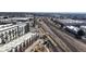 Aerial view showcasing the neighborhood and train tracks at 108 W Byers Pl # G4, Denver, CO 80223