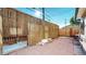 Fenced backyard with a patio and some snow on the ground at 108 W Byers Pl # G4, Denver, CO 80223