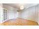 Bedroom with hardwood floors, closet, and neutral decor at 108 W Byers Pl # G4, Denver, CO 80223