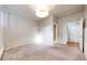 Well-lit bedroom with carpeting, neutral colors throughout and an entryway at 108 W Byers Pl # G4, Denver, CO 80223