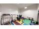 Well-equipped exercise room with treadmill and weights for convenient workouts at 108 W Byers Pl # G4, Denver, CO 80223