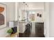 Bright and modern kitchen featuring a granite island with barstool seating at 10465 Evansville Cir, Parker, CO 80134