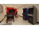 Finished basement featuring game consoles, gaming chairs, and a foosball table at 10059 Granite Hill Dr, Parker, CO 80134