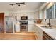 Bright kitchen with stainless steel appliances and natural light at 10059 Granite Hill Dr, Parker, CO 80134
