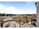 Balcony view showing surrounding community, landscaping, and neighborhood homes at 2676 W 68Th Ave, Denver, CO 80221
