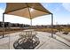 Outdoor community space offering shaded seating for social gatherings at 2676 W 68Th Ave, Denver, CO 80221